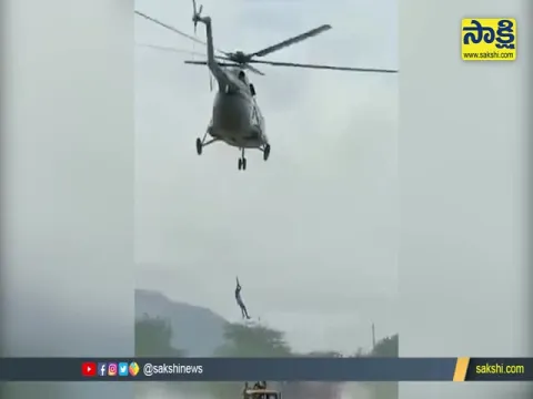 TS Disaster Management Rescued Two People Trapped In Floods Mancherial