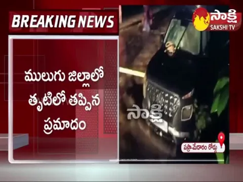 Car Stuck In Flood At Mulugu District