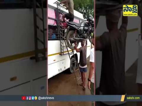 Viral Video : Boy Climbs Bus With Motorbike On His Head