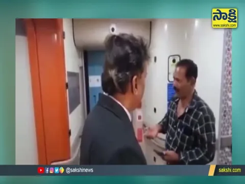 A Person In Rajahmundry Step Up To Vande Bharat Express Train For Photos