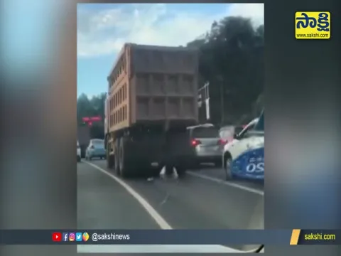 A Women Escape From Big Road Accident