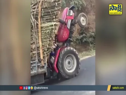 Tractor Carrying Heavy Load Climbs Up The Stairs