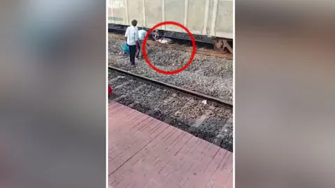 Old Man Miraculously Survives Train Ran Over Him In Khammam