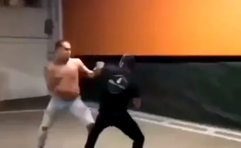 Triple OG Mexican Gangster squares off with an MMA fighter in a Parking Lot