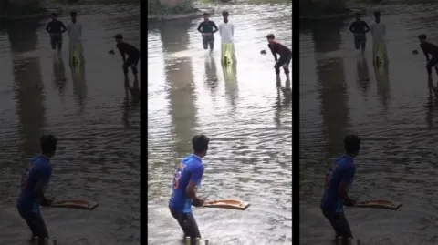 Viral Video Cricket Fans Palying Cricket In River 