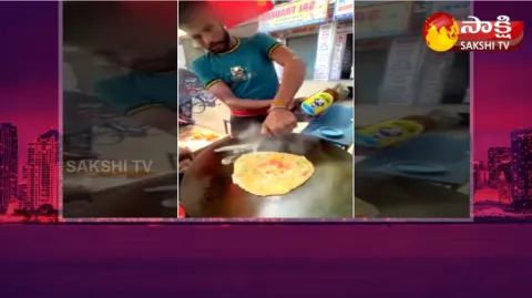 Man Making Egg Omelette With Beer 