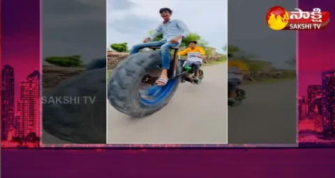 Garam Garam Varthalu Tractor Wheel Fixed To Bike 