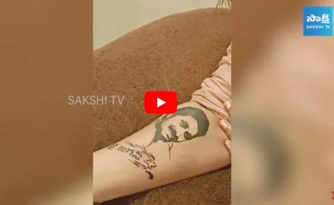 CM Jagan Photo Tattoo On Young Lady Fan Hand 