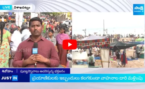Devotees Holy Bath At Visakha Beach
