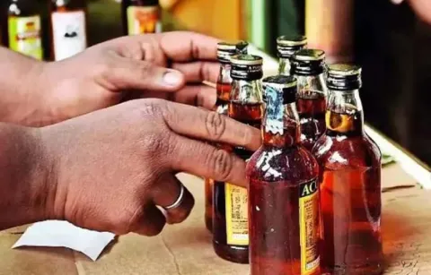 Theft in a liquor store in karimnagar