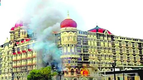 26/11