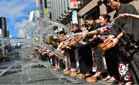 Traditional Japanese Uchimizu Technique Sprinkling Water Works To Vool 