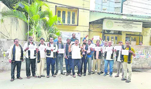 రిజిస్ట్రేషన్ల స్లాట్‌ బుకింగ్‌ విధానాన్ని రద్దు చేయాలి