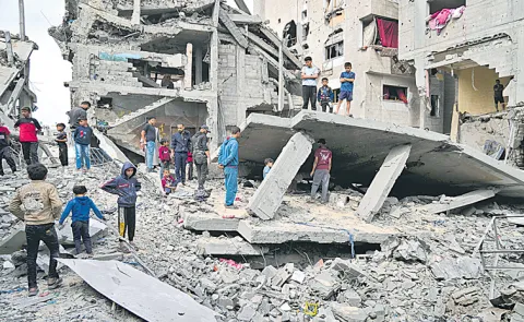 Israel kills over 100 in Gaza as Palestinians mark 77 years since the Nakba12