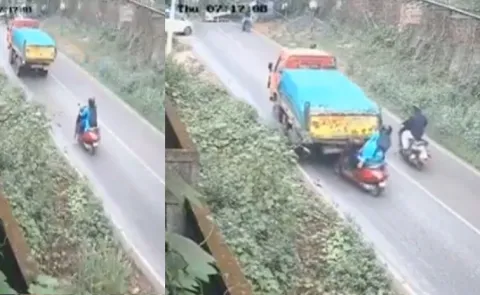 Kerala woman on scooter escapes death by a whisker as truck rolls backwards