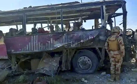 Suicide car bomb hits school bus in Pakistan12