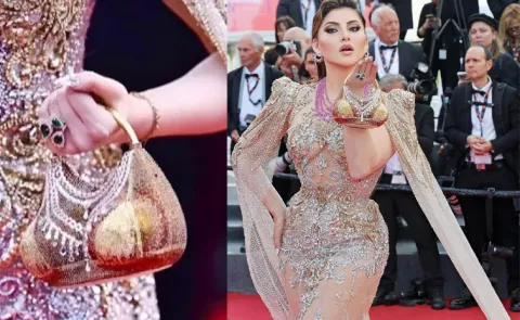 Urvashi Rautela Creates A BUZZ With Her Gold And Diamond Bag At Cannes13