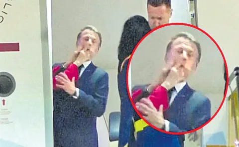 Macron plays down apparent shove from wife in Vietnam12