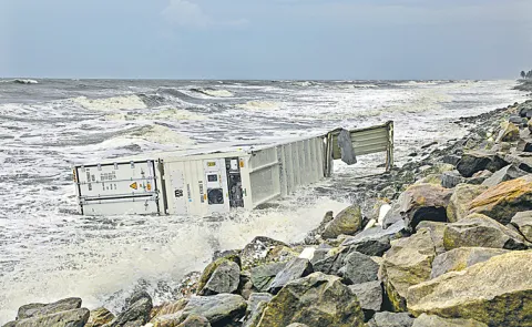 Containers from capsized ship drift to Kerala coast