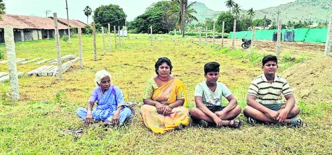 భర్త మరణాన్ని మరువక ముందే భూమి ఆక్రమణ