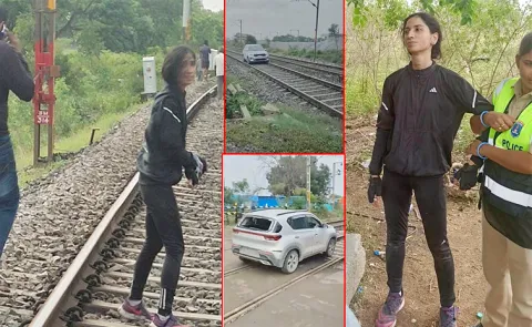 Vikarabad: Young Woman Drives Car On Railway Tracks3