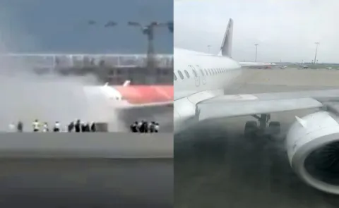 Air India plane catches fire after landing at Delhi airport12