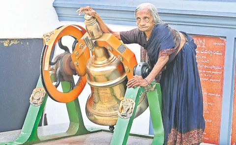 80 years old woman ringing temple bell in Hyderabad15