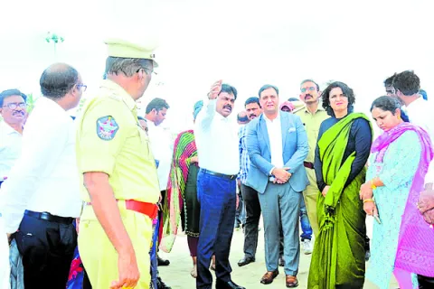  District Collector, SP, and officials inspecting Suryalanka Beach