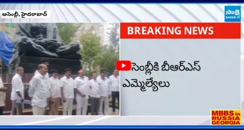 BRS MLAs Dharna At Telangana Assembly Gandhi Statue Over Party Change Leaders 3