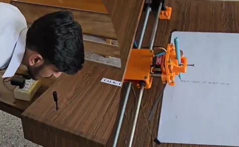 Kerala Student Unveils Talk to Write Device