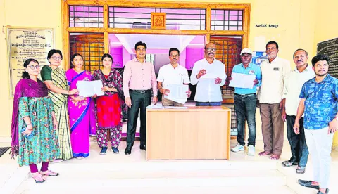  Officials releasing the final voter list at the Zilla Parishad office