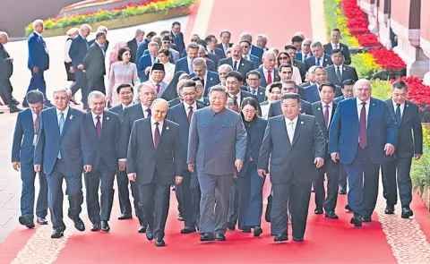 China unveils latest weapons in military parade
