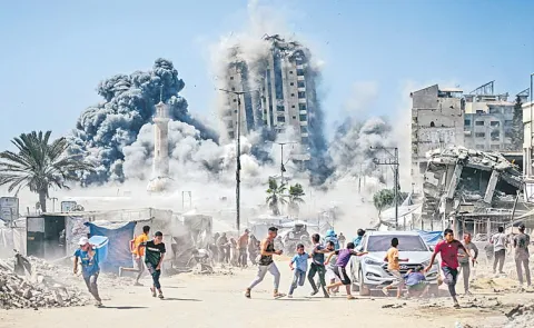 Israel bombs high-rise towers as brutal Gaza City