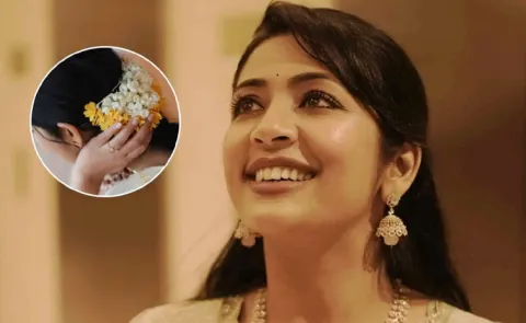 Malayalam actress Navya Nair fine for carrying a jasmine gajra