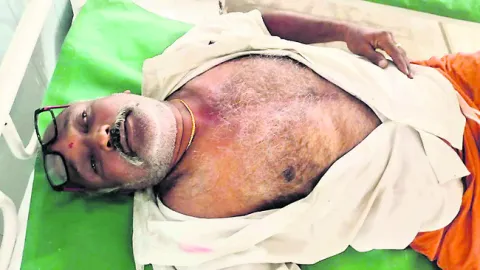 వ్యాపారిపై టీడీపీ నాయకుడి దాడి 