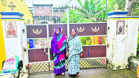 భర్త ఇంటి ముందు భార్య ఆందోళన