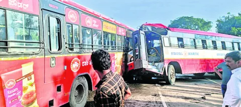 టైరు పేలి.. రెండు బస్సులు ఢీ  