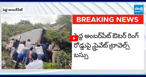 Private Travels Bus Overturned at Pedda Amberpet Outer Ring Road 1