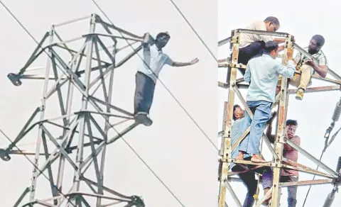 Drunk man climbs electricity tower