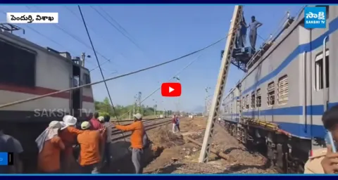Electric Pole Falls on Train in Visakhapatnam 1