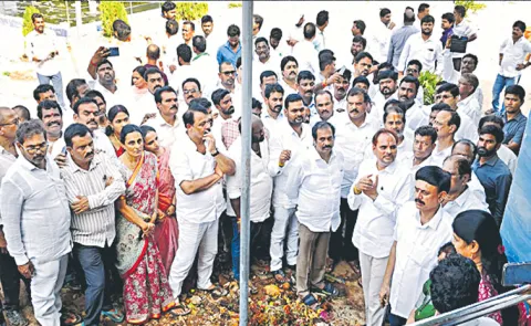 Leaders inspect the temple where the Kashi Bugga stampede took place
