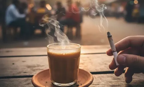 Story On Smoking a cigarette while drinking tea is like inviting disease.