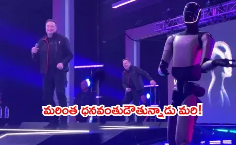 Elon Musk Dances With Robot As Tesla Okays His 1 Trillion Pay Package