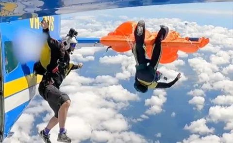 Skydiver Dangles from Plane After Parachute Snags on Aircrafts Tail Video viral