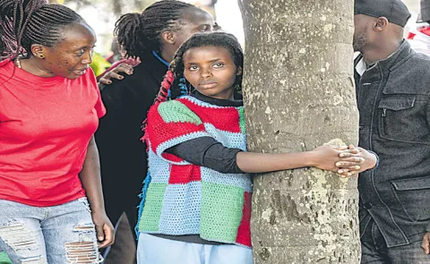 Kenyan environmental activist Truphena Muthoni tree hugging of world record 