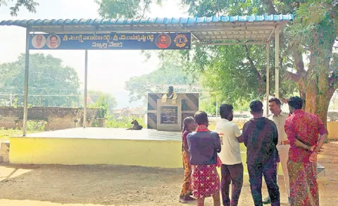 Kolatturu ZP High School controversy where a TDP leader father statue on school stage