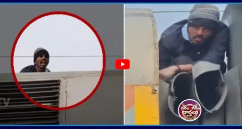 Man Sits Between Train Compartments 1