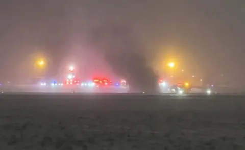 Aircraft crashes and overturns at Bangor International Airport 