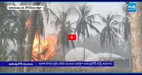 Firefighters Controlling Fire with Umbrella Water System  2