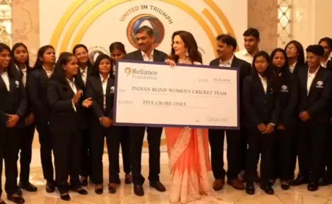 Caption for NMA With Blind Womenn Team And Cheque Handover